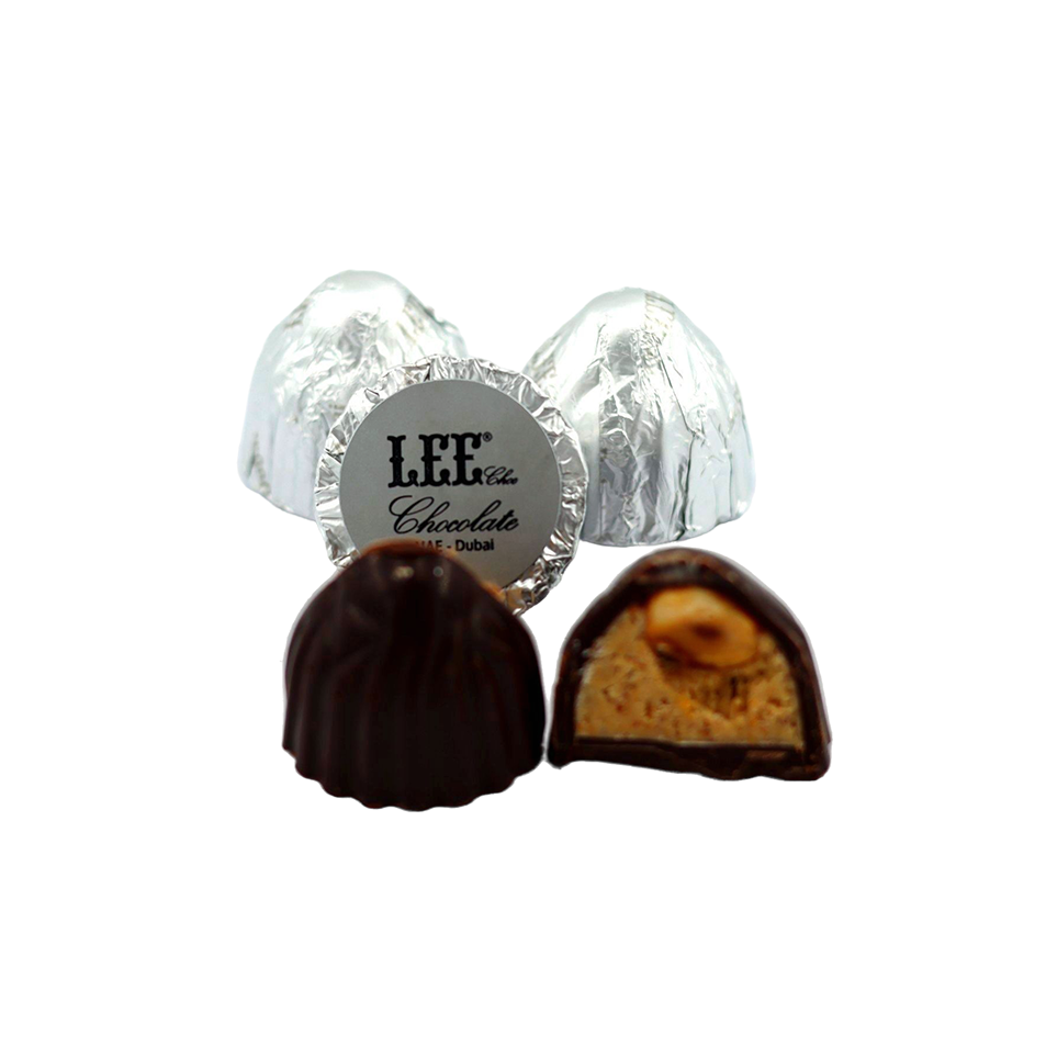 Choklad med kex och hasselnötter شوكولاتة ليه – شوكولاتة الحليب مع البسكويت وحبّة البندق - Bild 1