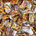 راحة بالرمان والفستق الحلبي مع جوز الهند - 500غ